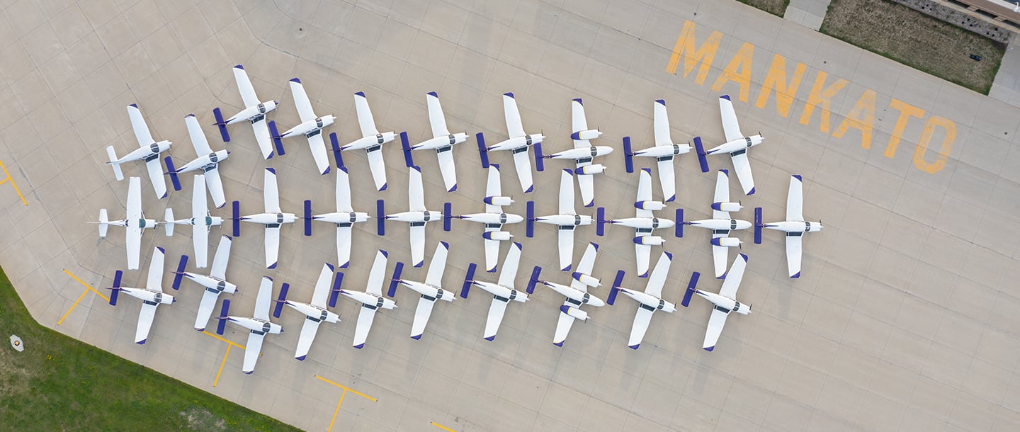 An aerial view of the fleet of North Star Aviation planes lined up at the Mankato Regional Airport