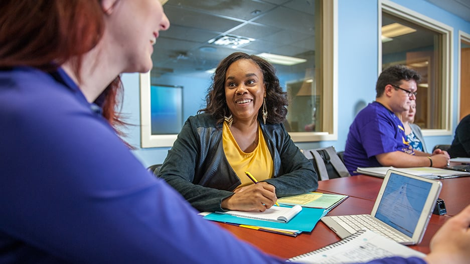 Advising at a table. 