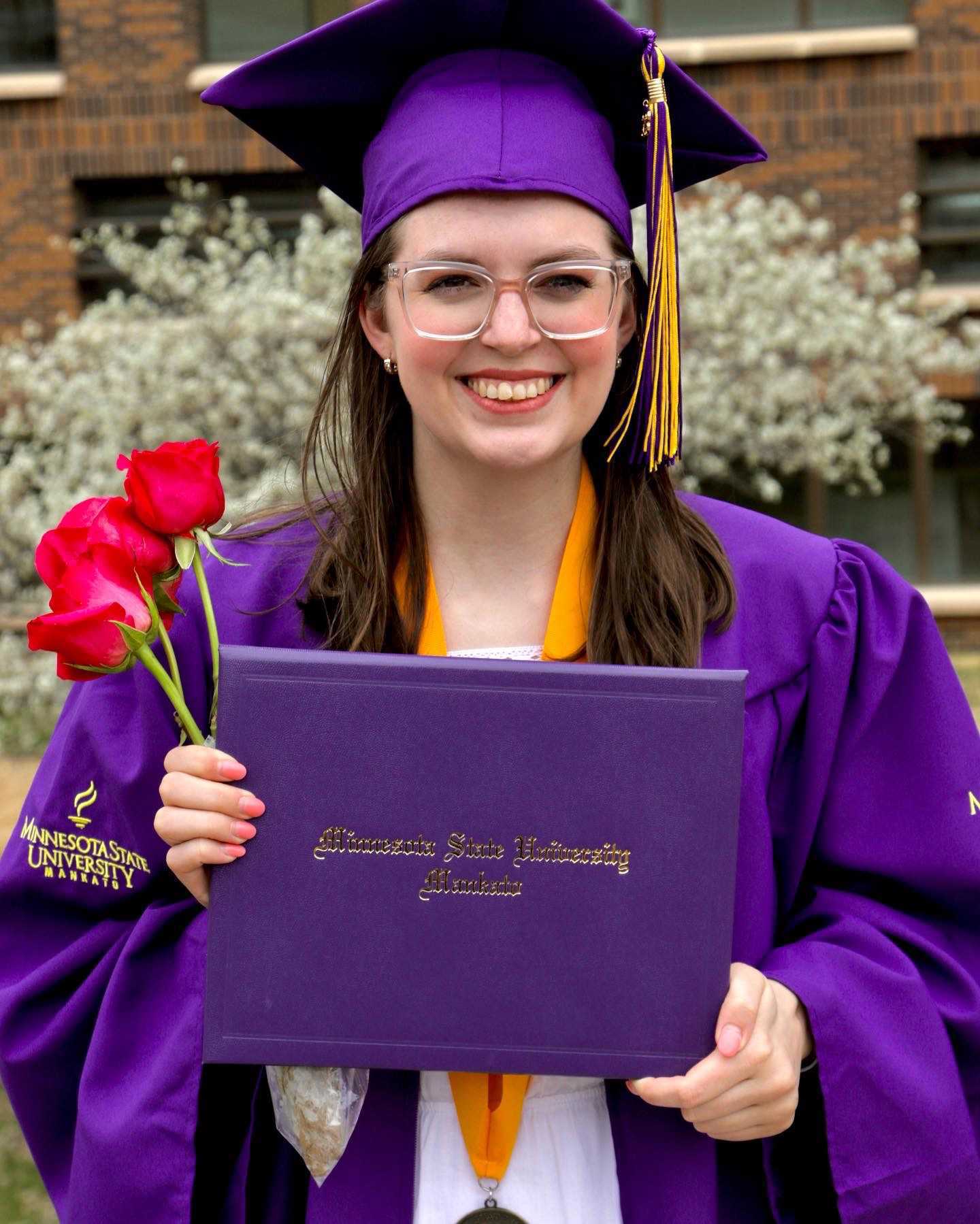 Headshot of Claire Borne, alumna.